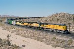 Union Pacific C40-8W #9371 (with C&NW C41-8 #8545, C44-9W #8632 & SD60 #8023) departing the siding 